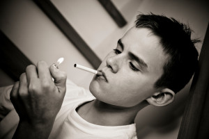 Boy Smoking Thumb