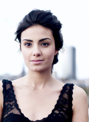 ... Hart is the actress who plays the role of Ariadne in Atlantis . [1