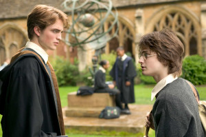 Robert Pattinson as Cedric Diggory and Daniel Radcliffe as Harry ...
