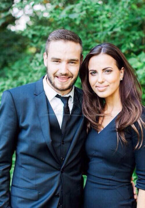 Liam Payne with Sophia Smith at Louis Tomlinson's parents' wedding on ...