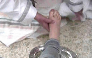 Two of the 12 people to have their feet washed were young women, an ...