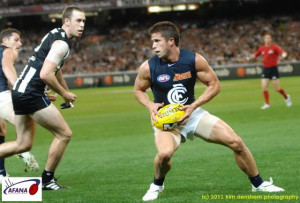 Carlton Midfielder gets the ball and turns to start a midfield Blues ...