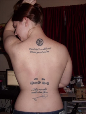 On the top of my back, I have a quote from Alice in Wonderland: