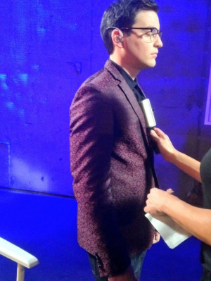 Last minute touch ups for James Wolpert before stage.James Wolpertmi