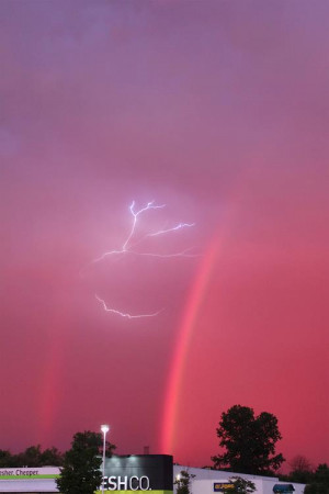 ... this shot. Lightning between a double rainbow during a thunderstorm