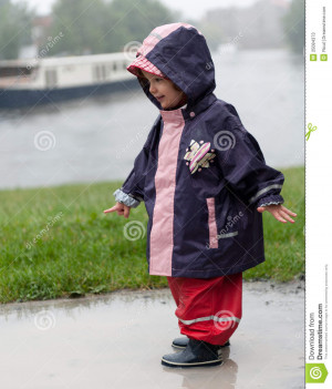 Stock Photos: Little girl in a puddle