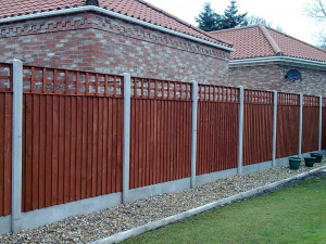 5ft featheredge 1ft trellis with concrete posts and gravel boards