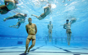 SEAL trainees during the Drown Proofing Test, where they must untie ...