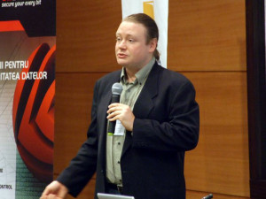 Brian Behlendorf in one of the conferences panels speaking about