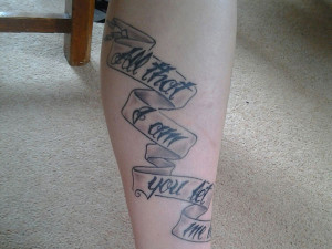 Serpentine scroll tattoo sitting on the leg asserts the wearer’s ...