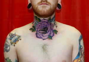 Purple Ink Rose Flower Tattoo On Neck