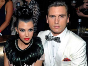 Getty Scott Disick with the mother of his two children, Kourtney ...