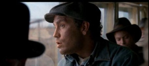 John Malcovich as Lennie Small in Of Mice and Men