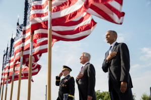 ... and Gen. Martin Dempsey listen to the national anthem, Sept. 11, 2014
