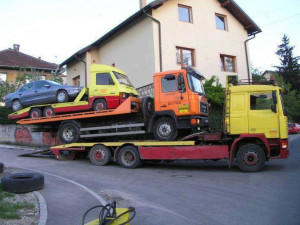 Tow truck towing a tow truck towing a tow truck towing a car!