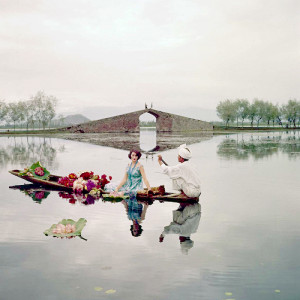... Lake, Kashmir, India. British Vogue, 1956.Photo by Norman Parkinson