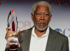 Morgan Freeman's a busy guy. He picked up the movie icon award at ...