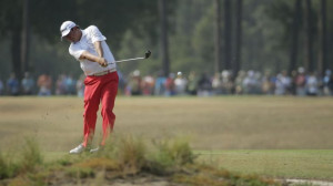 Jason Dufner hits from the fairway on the 16th hole during the second