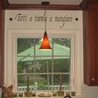 An Italian kitchen wall quote above the kitchen window and in between ...