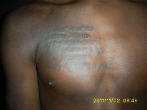 Tupac Quote over Birthmark tattoo
