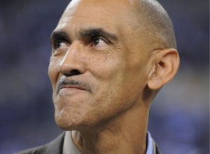 Former Colts coach Tony Dungy watches as his name is unveiled inside ...
