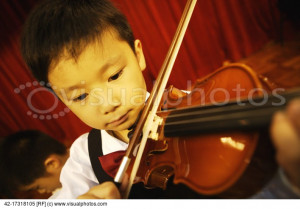 Elementary Student Practicing Violin