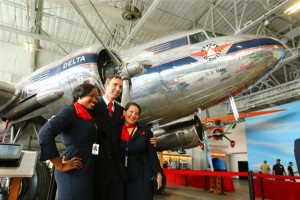 and first ceo c e woolman the display includes a portrait of woolman ...