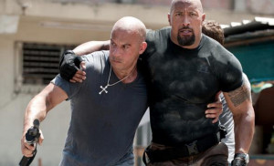 MUSCLED FRIENDS. Vin Diesel is Dominic Toretto and Dwayne Johnson is ...
