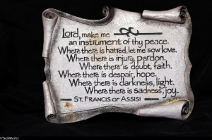 Rock-like plaque with quote from St. Francis of Assisi