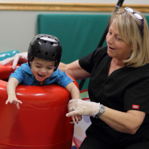 Pediatric physical therapists provide evaluation and treatment to ...