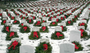 Christmaswreaths adorn head stones at Arlington National Cemetery. The ...