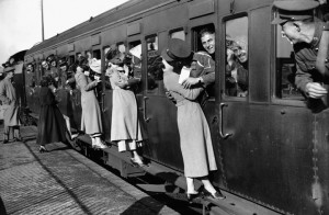 London, 1935 - Soldiers departing for Egypt from Feltham Station lean ...
