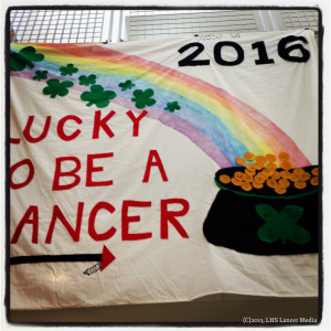 Class of 2016 banner. Features a rainbow, pot of gold, and “Lucky to ...