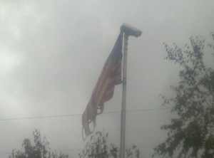 ... American flag, with a security camera on it. Symbol of the times