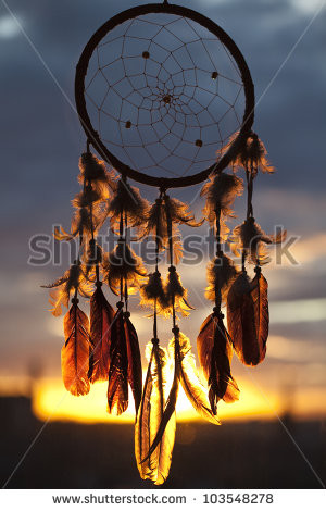 Dream-catcher with sunset on the background