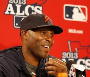 Detroit Tigers outfielder Torii Hunter laughs during a news conference ...