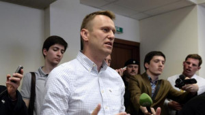 Russian opposition leader Alexei Navalny talks to the media during a ...