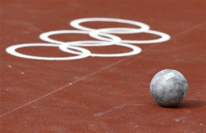 shot put is seen on the ground during the men's shot put ...