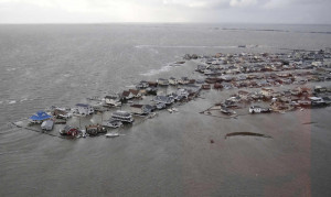 Superstorm Sandy leaves destruction, darkness and death in its wake