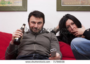 stock-photo-bored-wife-and-arrogant-husband-watching-television ...
