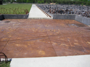 Entrance to Belzec memorial Inscribed cast iron plate in form of a ...