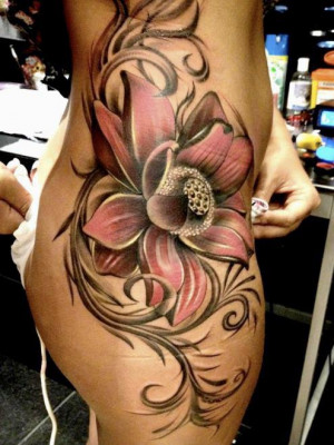 See more Stunning flower tattoo on side body