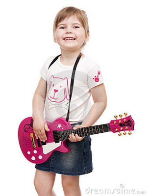 Little Girl Playing Electric Guitar Little girl playing toy pink