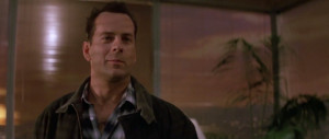 Photo of John McClane , as portrayed by Bruce Willis in 