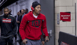Derrick Rose leaves the Moda Center on crutches after he was injured ...