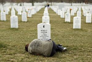 Lesleigh Coyer, 25, of Saginaw, Michigan, lies down in front of the ...