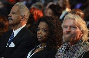 : US talk show host Oprah Winfrey, centre, her husband Stedman Graham ...
