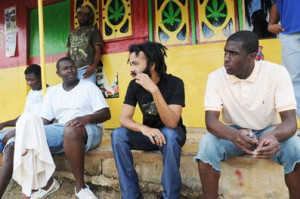 Protoje (centre) chats with some of his friends from his neighbourhood ...