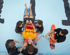 2nd Class Evan Schacht and Lucas Graham instruct rescue swimmers ...