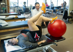 ... for her ACL injury. She works with physical therapist, Sam Kang
